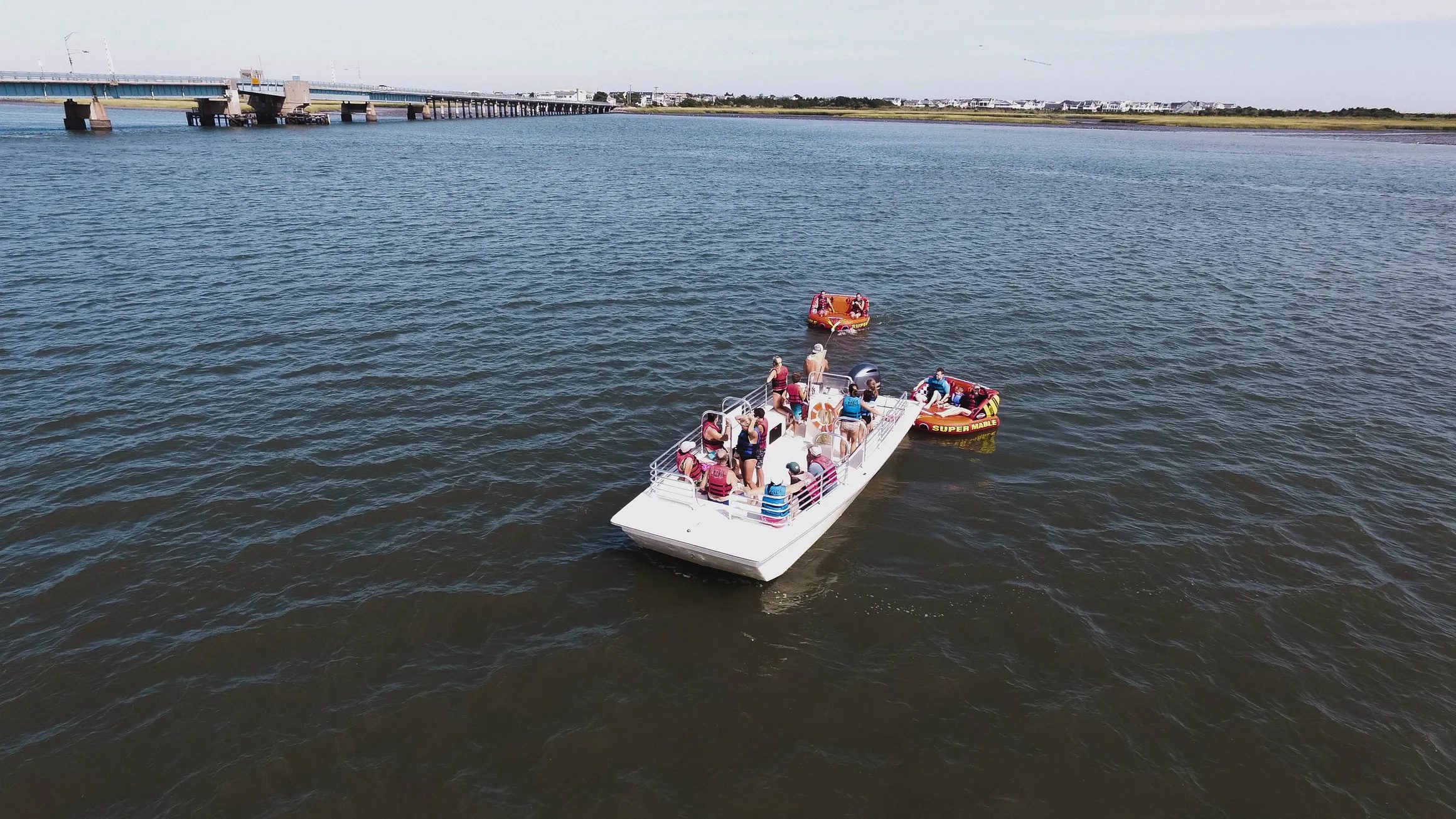 The Group Tubing boat anchored on the Stone Harbor back bay
