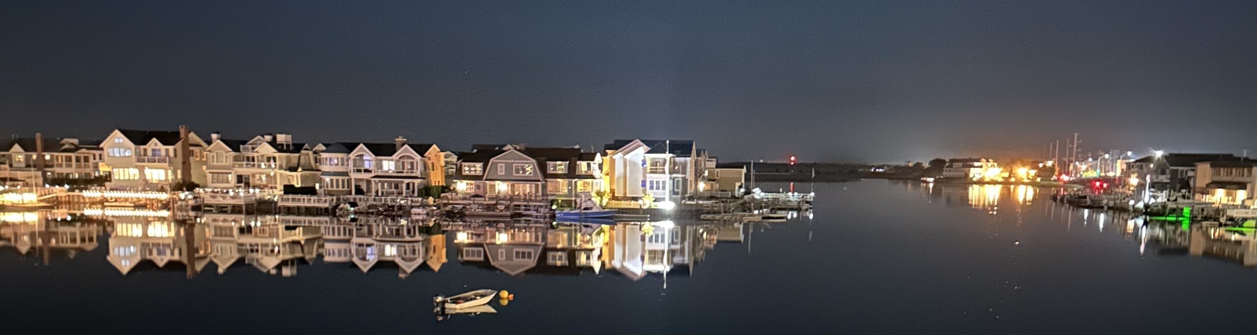 Stone Harbor back bay basin at twilight — future home waters of Island Spirits, launching Summer 2027