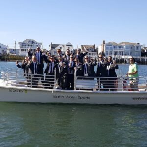 Groomsmen party cruising on the Island Water Sports 22-passenger charter in Stone Harbor